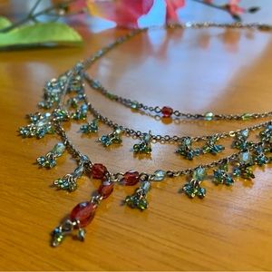 Bib-style necklace with dangling glass beads in green, blue and red, 20 inches